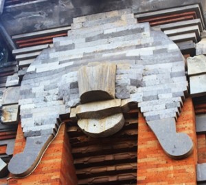 Boma carving in its early stages by Lempad. Pura Pengastulan temple, Bedulu.