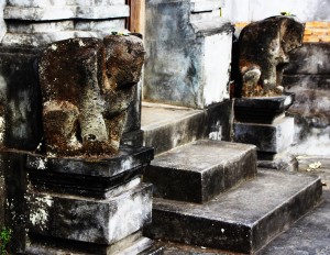 Unformed stone monkeys flank the entrance to Lempad's Bedulu house.