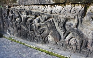 A hunting scene forms part of the Yeh Puluh carvings, Bedulu, Bali.